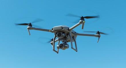 Drone flying against clear blue sky aerial view