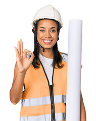 Young Filipino female architect cheerful and confident showing ok gesture.