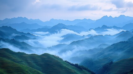 Fototapeta premium Misty mountain range, serene landscape