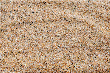 Colorful sand are on the seaside.
