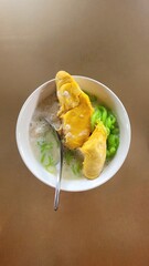 Durian Cendol Dessert in Bowl, Traditional Malaysian Sweet Treat with Coconut Milk