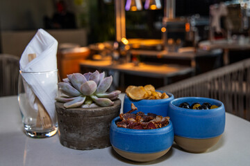 Plant decor and snacks on a table