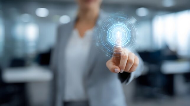 Businesswoman interacting with a digital interface in a modern office setting.