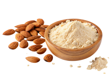 Organic almond flour in wooden bowl with almonds for gluten free baking and healthy eating