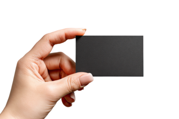 A woman's hand holds a blank black business card against a black background.  Close-up view