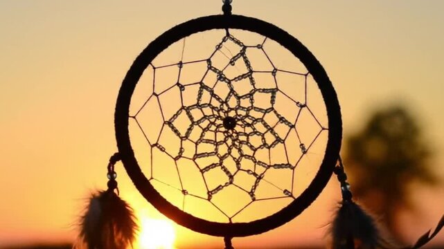 Dreamcatcher Silhouette at Sunset Capturing Peace with Serenity, and and Native American Spirit.