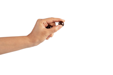 Chocolate ball in hand on transparent background