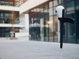 Man With Exoskeleton Legs Using Crutches in Park Demonstrates Mobility, Technology and Hope Everyday Life. A man walks outdoors in a park wearing leg prosthetics and forearm crutches, showcasing adapt