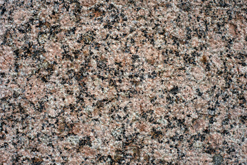Texture of stone with yellow tint. Rock background. Stone