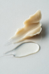 Cosmetics swatches, textures, cream, gel, bright background