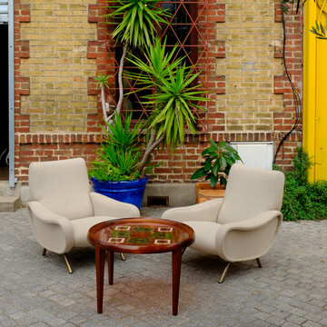 Paris, France, Europe.  The famous and worlds largest flea market - the St. Ouen "Marche des Puces.2 fabulous mid century chairs and table