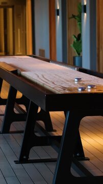 Game Of Indoor Tabletop Shuffleboard