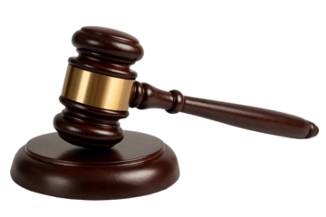 Close-up of a wooden judge gavel with golden band resting on a sound block, symbol of law, justice, authority, legal decision, courtroom and auction concept isolated on transparent background