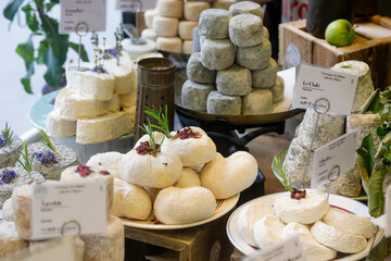 Paris France. Food markets around the 18th Arrondissment. Beautiful, fresh gourmet cheese at a fromagerie