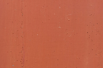 Orange wall texture with scratches and black dots