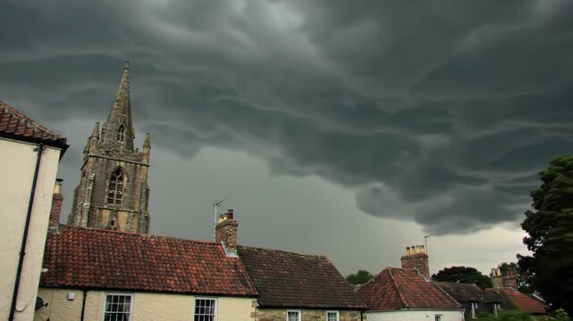 Stormy Skies Over Rural Village: Dramatic Asperitas Clouds