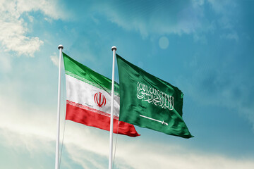 Iran Saudi Arabia friendship flags are waving in the sky. Two country flag for agreement or deal. Iran KSA national flag for commitment.