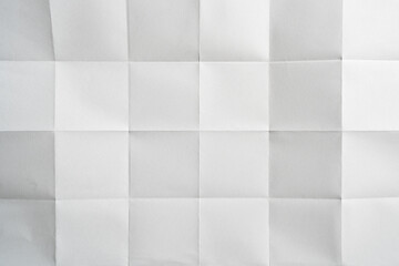 Abstract white paper background with folded squares texture