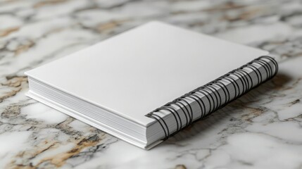 Blank Spiral Notebook on Elegant Marble Surface for Creative Use