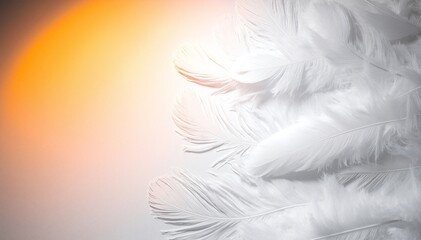 Obraz premium A delicate white feather gently rests against a textured wall, its soft, wispy strands catching the light, creating a serene and tranquil atmosphere.