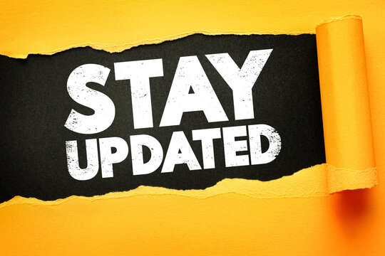 White bold text "STAY UPDATED" appears behind torn yellow paper on a black background, symbolizing communication, newsletter prompts, alerts, announcements, and staying informed or connected