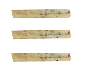 Set of three old, stained masking tape strips arranged horizontally on a white background. aged and worn with visible marks and discoloration
