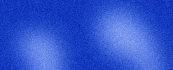 Abstract grainy blue background with soft light flares