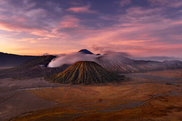  Beautiful sunrise at Tengger volcanic chain with smoking Bromo mount and the colorful Batok mount, Bromo - Tengger Semeru National Park, East Java, Indonesia
