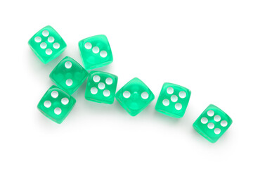Many green game dices on white background
