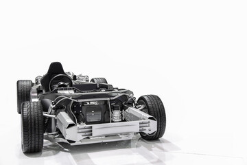 Formula one car engine detail isolated on white background.