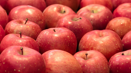  Fresh ripe red apples background. Top view of natural apples