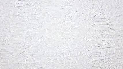 White stucco wall surface with visible plaster texture and rough lines. Close-up of decorative textured wall finish. Background with space for text. Mockup stage template
