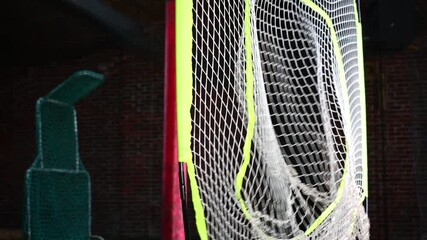 softball net close up of ball hitting the net - Powered by Adobe