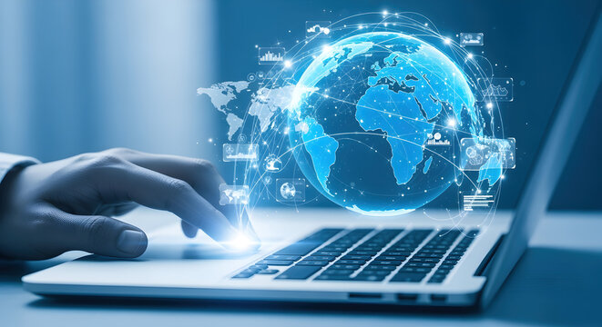 Close Up Person Hand Typing Laptop with Blue Digital Globe Overlay Representing Global Connectivity and Modern Technology