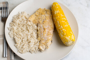  baked haddock with  corn and rice