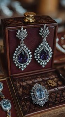 a pair of diamond and amethite earrings and a pair