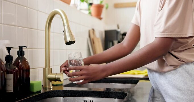 Home, hands and woman with tap water in glass for hydration, natural nutrients and thirsty. Kitchen, person and pour liquid at faucet for refreshing drink, fresh beverage and body detox for wellness