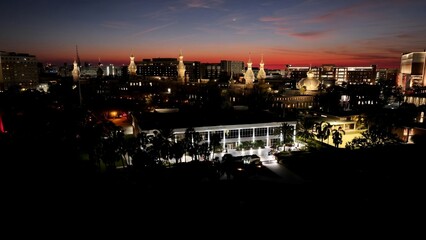 Fototapeta premium Sunset University Of Tampa In Tampa Florida United States. Modern City Center With Skyscrapers Reflecting The Urban Life. Building Town Sky Clouds Illumination Urban. Town Illumination.