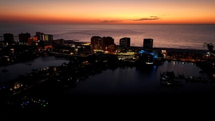 Fototapeta premium Colorful Sunset In Clearwater Florida United States. Modern City Center With Skyscrapers Reflecting The Urban Life. Sunset Paradise Island Skyline Season Beauty. Paradise Island Sea Season.
