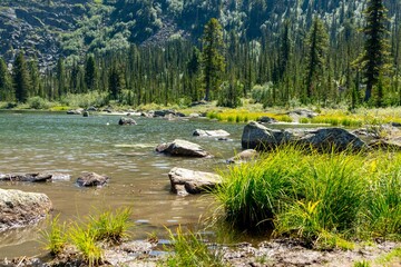 Mountain landscape. The rocky shore of a mountain lake. Ergaki Nature Park