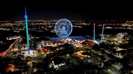 Night Illuminated Ferris Wheel In Orlando Florida United States. Breathtaking Aerial View Of Famous...