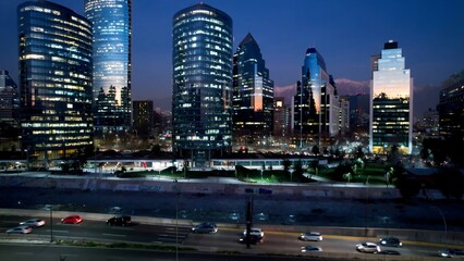 Sunset City In Santiago Metropolitan Region Chile. Landmark Skyscraper Overlooking The Vast Urban...
