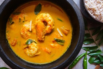 Malabar Shrimp curry in ground coconut turmeric gravy served with rice