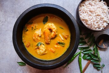 Malabar Shrimp curry in ground coconut turmeric gravy served with rice