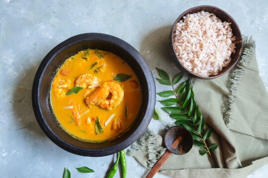 Malabar Shrimp curry in ground coconut turmeric gravy served with rice