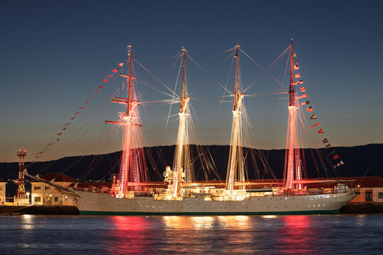 Juan sebasti&aacute;n de elcano training ship docked at mar&iacute;n naval school at dusk