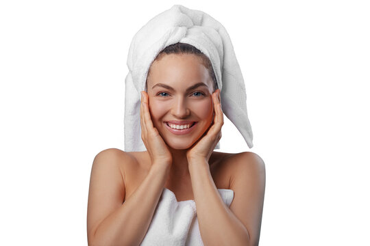 Smiling young woman wrapped in a white towel with a towel turban on her head. PNG with transparency