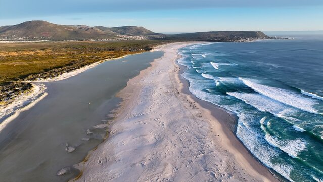 Noordhoek Beach In Cape Town Western Cape South Africa. Breathtaking Aerial View Of A Lush Tropical Coastline Scenery. Shore Clouds Sky Beach Sea. Seaside Panorama. Cape Town Western Cape. - Powered by Adobe