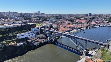 Obraz premium Porto Skyline In Porto Portugal. Birds Eye View Of Stunning Dark River And Forest Trees. Industry Skyline Commercial Building Awesome. Commercial Building Architecture Business. Porto Portugal.