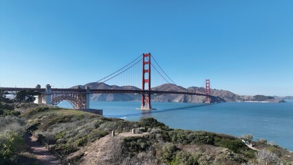 Sunset Golden Gate Bridge In San Francisco California United States. Traffic Is Moving Across A Modern Cable-Stayed Bridge. Building Town Sky Clouds Illumination Urban. Exterior Famous.